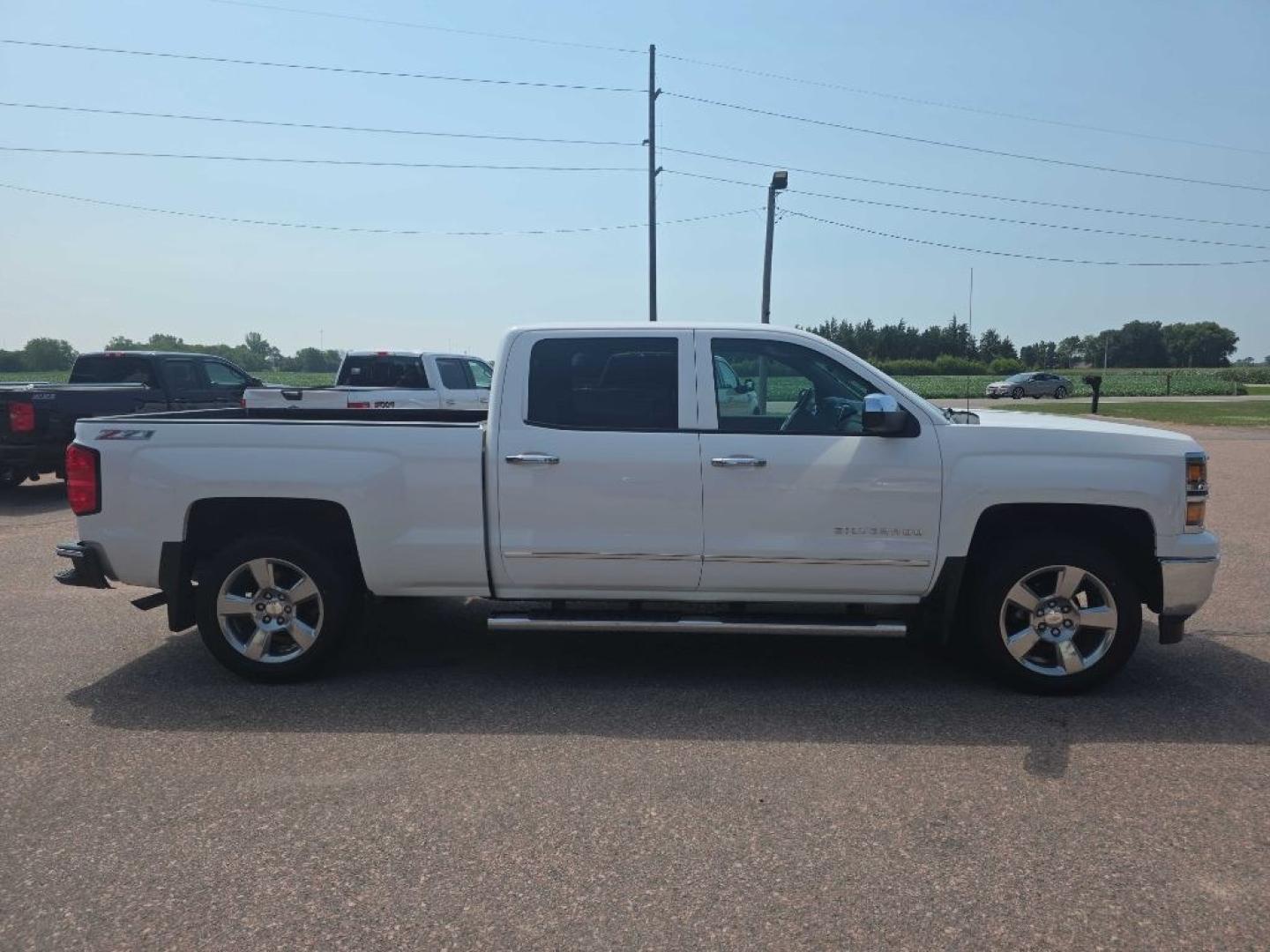 2014 WHITE CHEVROLET SILVERADO 1500 LTZ (3GCUKSEC6EG) with an 5.3L engine, Automatic transmission, located at 495 Old Highway 20 West, South Sioux City, NE, 68776, (402) 494-2677, 42.458408, -96.443512- Photo#4