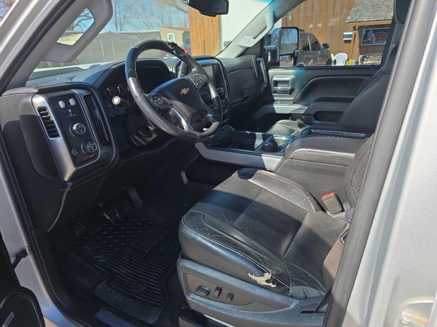 2015 SILVER CHEVROLET SILVERADO 2500 HEAVY DUTY LTZ (1GC1KWE84FF) with an 6.6L engine, Automatic transmission, located at 495 Old Highway 20 West, South Sioux City, NE, 68776, (402) 494-2677, 42.458408, -96.443512 - Photo#7