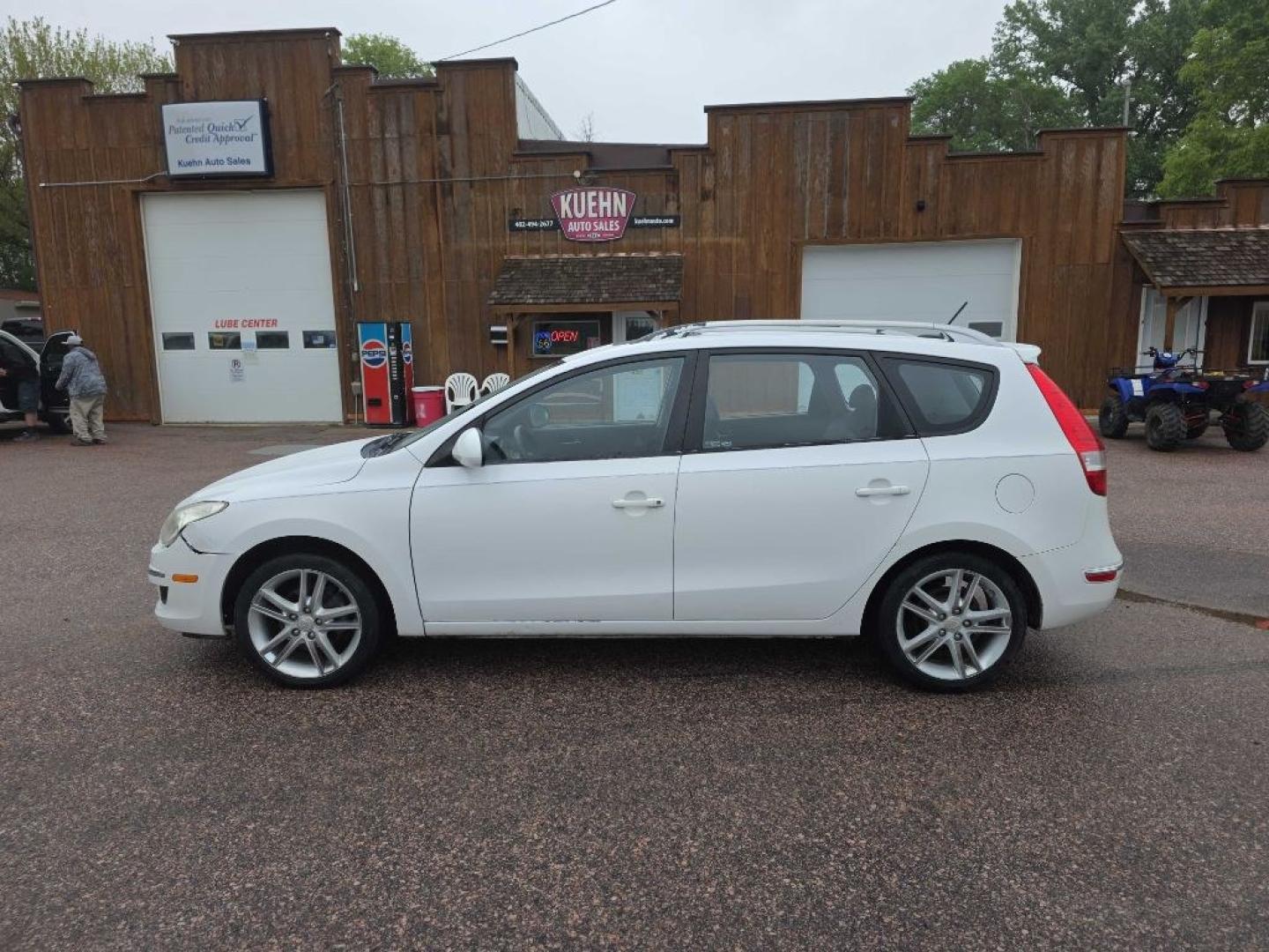 2011 WHITE HYUNDAI ELANTRA TOURING GLS (KMHDC8AE1BU) with an 2.0L engine, Automatic transmission, located at 495 Old Highway 20 West, South Sioux City, NE, 68776, (402) 494-2677, 42.458408, -96.443512- Photo#1