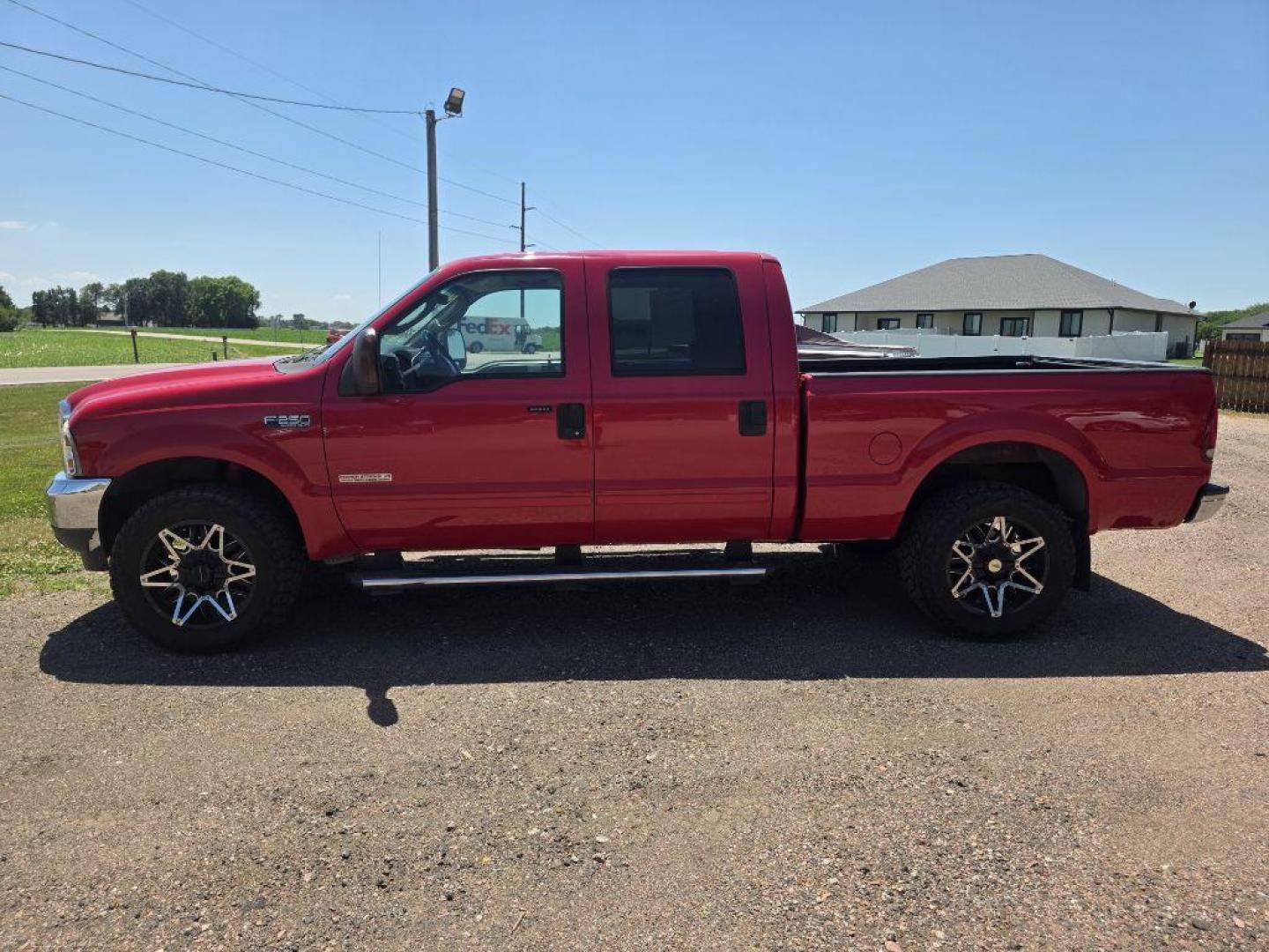 2004 RED FORD F250 SUPER DUTY (1FTNW21PX4E) with an 6.0L engine, Automatic transmission, located at 495 Old Highway 20 West, South Sioux City, NE, 68776, (402) 494-2677, 42.458408, -96.443512 - Photo#1