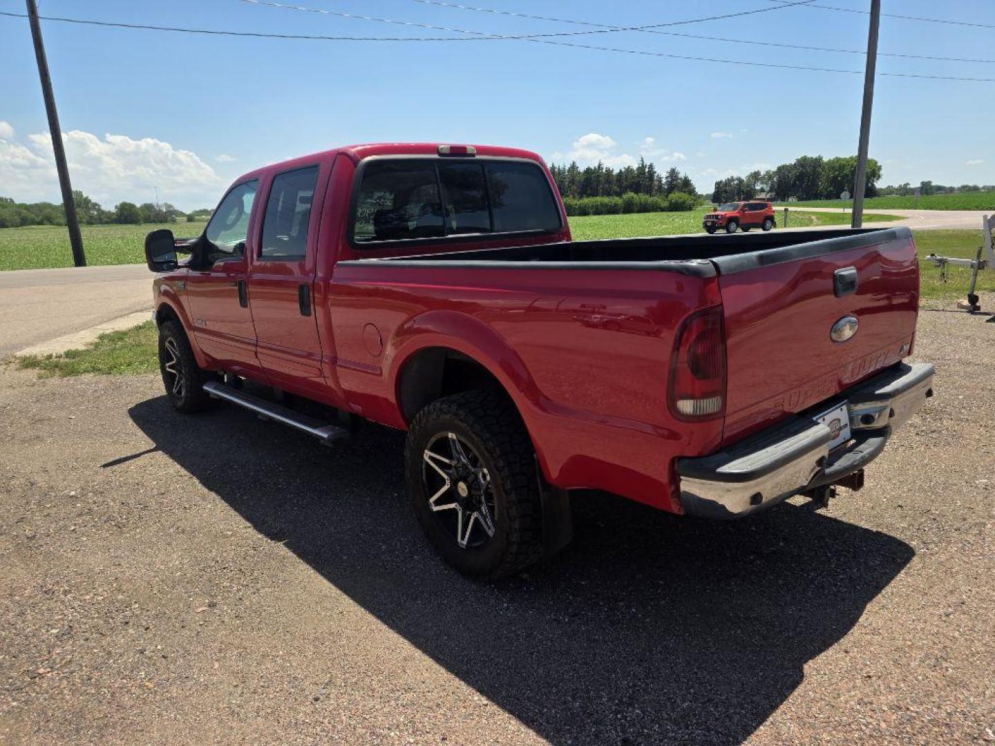 2004 RED FORD F250 SUPER DUTY (1FTNW21PX4E) with an 6.0L engine, Automatic transmission, located at 495 Old Highway 20 West, South Sioux City, NE, 68776, (402) 494-2677, 42.458408, -96.443512 - Photo#2