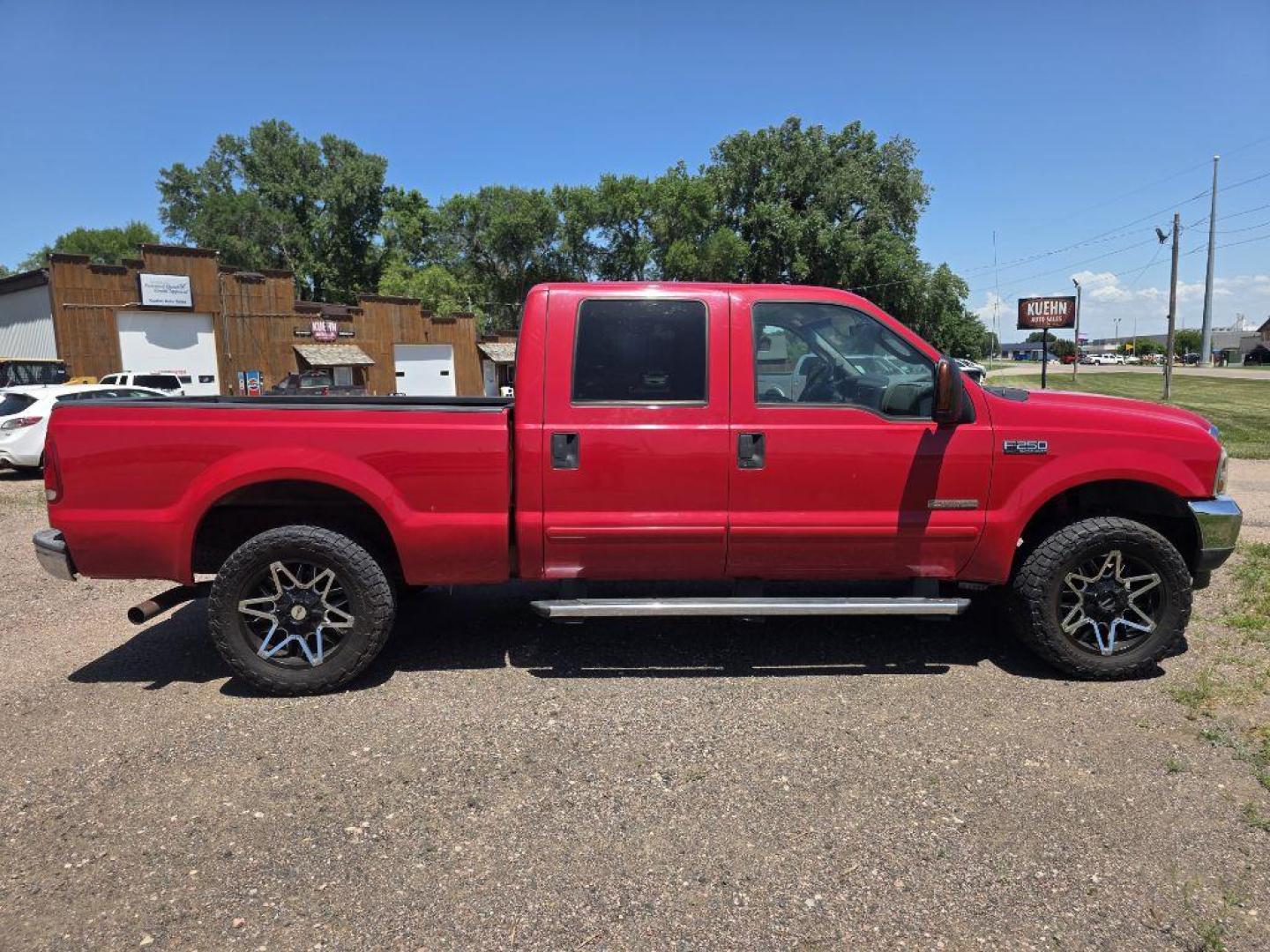 2004 RED FORD F250 SUPER DUTY (1FTNW21PX4E) with an 6.0L engine, Automatic transmission, located at 495 Old Highway 20 West, South Sioux City, NE, 68776, (402) 494-2677, 42.458408, -96.443512 - Photo#4