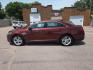 2015 MAROON FORD TAURUS SEL (1FAHP2H89FG) with an 3.5L engine, Automatic transmission, located at 495 Old Highway 20 West, South Sioux City, NE, 68776, (402) 494-2677, 42.458408, -96.443512 - Photo#0