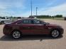2015 MAROON FORD TAURUS SEL (1FAHP2H89FG) with an 3.5L engine, Automatic transmission, located at 495 Old Highway 20 West, South Sioux City, NE, 68776, (402) 494-2677, 42.458408, -96.443512 - Photo#1