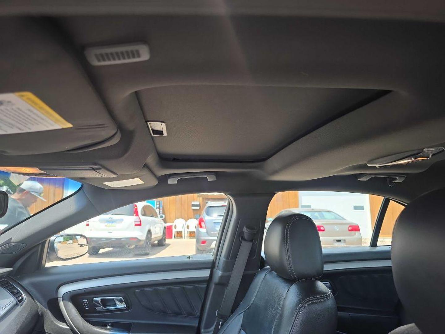 2015 MAROON FORD TAURUS SEL (1FAHP2H89FG) with an 3.5L engine, Automatic transmission, located at 495 Old Highway 20 West, South Sioux City, NE, 68776, (402) 494-2677, 42.458408, -96.443512 - Photo#6