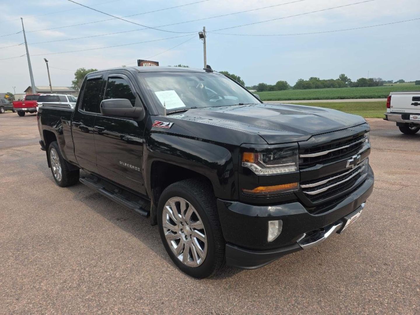 2017 BLACK CHEVROLET SILVERADO 1500 LT (1GCVKREC0HZ) with an 5.3L engine, Automatic transmission, located at 495 Old Highway 20 West, South Sioux City, NE, 68776, (402) 494-2677, 42.458408, -96.443512- Photo#5