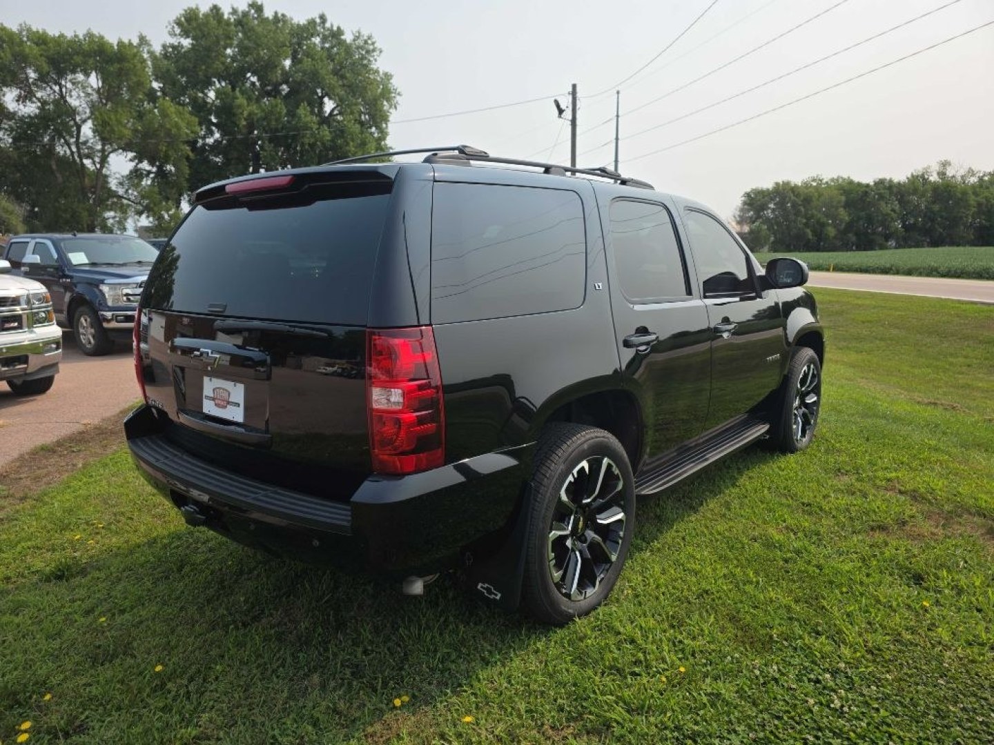 2013 BLACK CHEVROLET TAHOE 1500 LT (1GNSKBE01DR) with an 5.3L engine, Automatic transmission, located at 495 Old Highway 20 West, South Sioux City, NE, 68776, (402) 494-2677, 42.458408, -96.443512- Photo#13