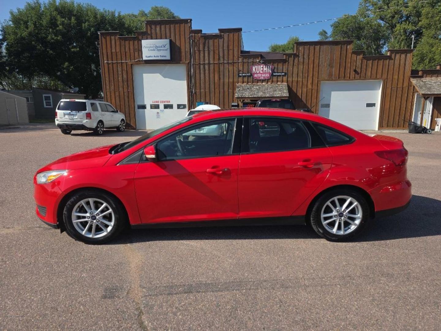 2015 RED FORD FOCUS SE (1FADP3F21FL) with an 2.0L engine, Automatic transmission, located at 495 Old Highway 20 West, South Sioux City, NE, 68776, (402) 494-2677, 42.458408, -96.443512- Photo#1