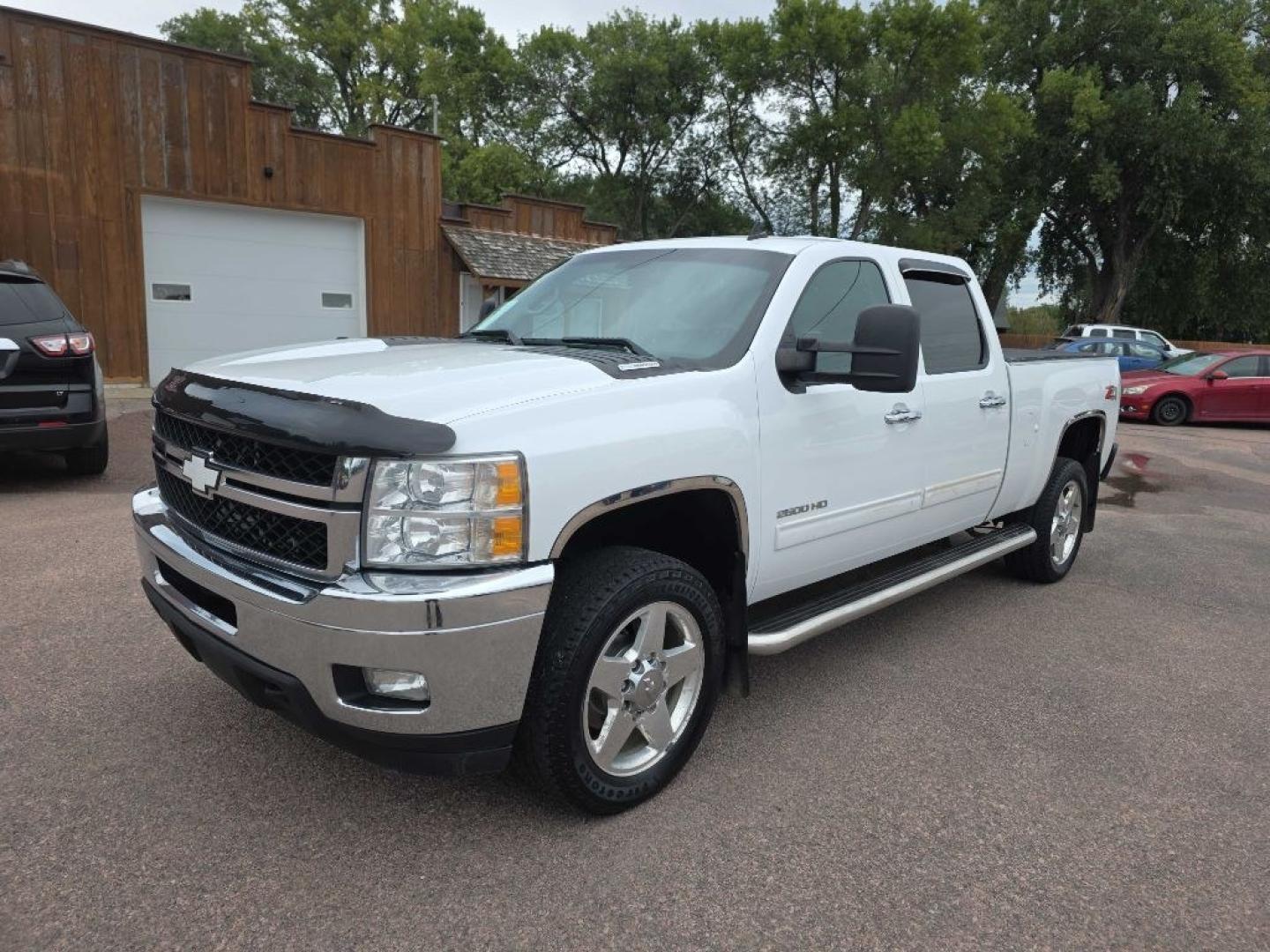 2014 WHITE CHEVROLET SILVERADO 2500 HEAVY DUTY LTZ (1GC1KYE80EF) with an 6.6L engine, Automatic transmission, located at 495 Old Highway 20 West, South Sioux City, NE, 68776, (402) 494-2677, 42.458408, -96.443512- Photo#7
