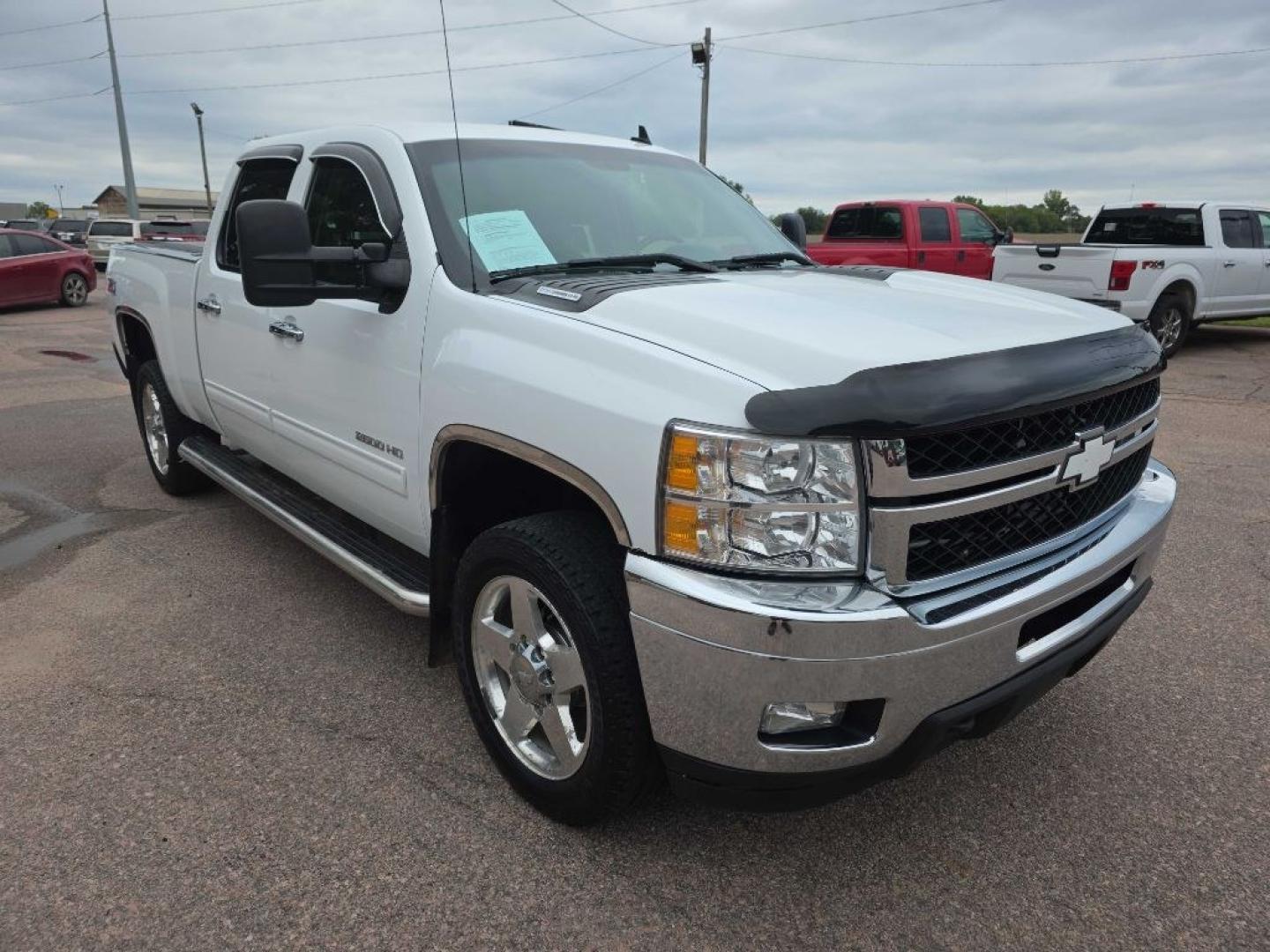 2014 WHITE CHEVROLET SILVERADO 2500 HEAVY DUTY LTZ (1GC1KYE80EF) with an 6.6L engine, Automatic transmission, located at 495 Old Highway 20 West, South Sioux City, NE, 68776, (402) 494-2677, 42.458408, -96.443512- Photo#8