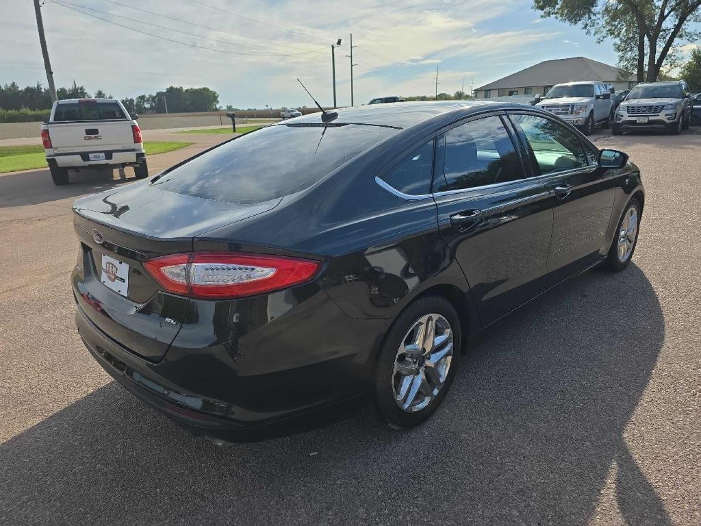 2014 BLACK FORD FUSION SE (1FA6P0H70E5) with an 2.5L engine, Automatic transmission, located at 495 Old Highway 20 West, South Sioux City, NE, 68776, (402) 494-2677, 42.458408, -96.443512- Photo#0